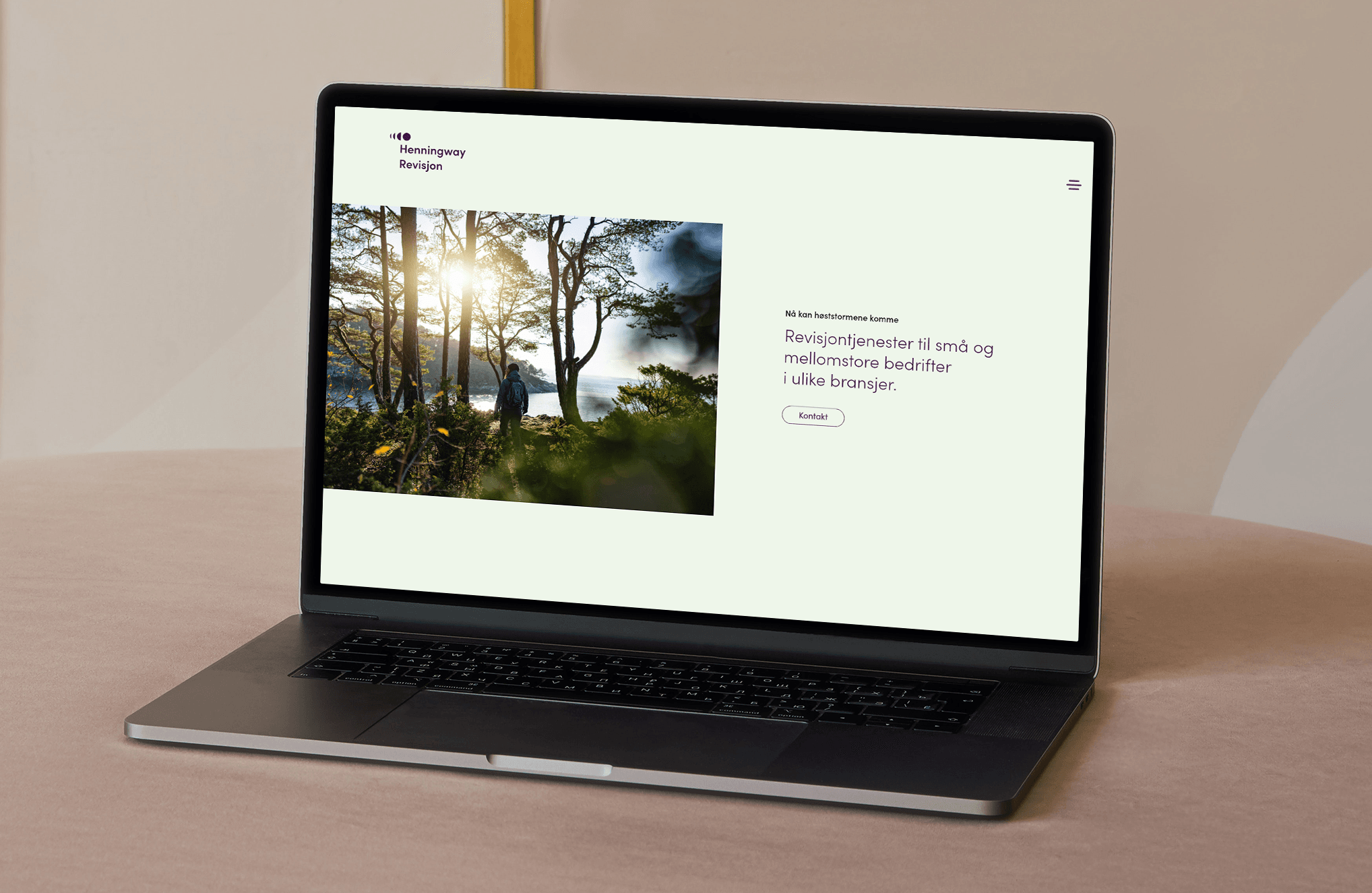 HENNINGWAY MacBook Pro on a Sofa Mockup